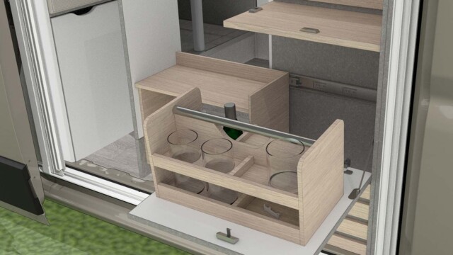 Un meuble bar coulissant est prévu dans l'entrée. Ce dernier intègre une tablette escamotable.